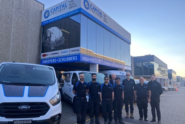 Capital Equipment Hire Team Photo Outside of Office